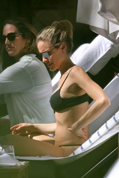 Kristin Cavallari in black bikini at a pool in Miami