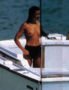 Valerie Kaprisky topless on a boat paparazzi photo