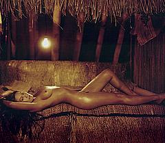 Tia Carrere lying naked mag scan