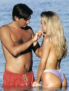 Brigitta Boccoli topless with honey in a water