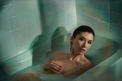 Jewel Staite naked in a bathtub