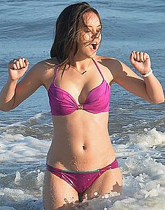 Hayley Orrantia in pink bikini
