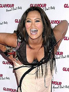 Tia Carrere sexy cleavage
