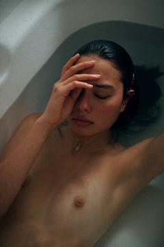 Bridget Hollitt nude in a bathtub by Isaac Brown