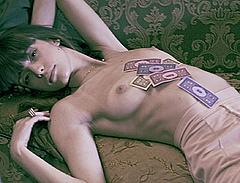 Stacy Martin lying topless