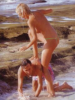 Lucia Lapiedra topless on a beach paparazzi photo
