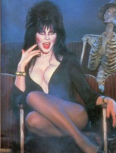 Cassandra Peterson legs and cleavage