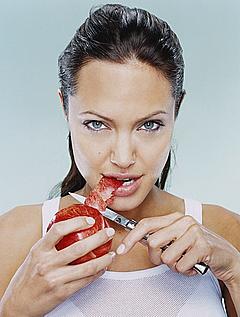 Angelina Jolie posing for Martin Schoeller