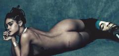 Rihanna lying naked shows her ass