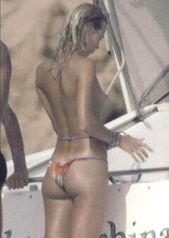 Ludmilla Radchenko topless on a boat paparazzi photo