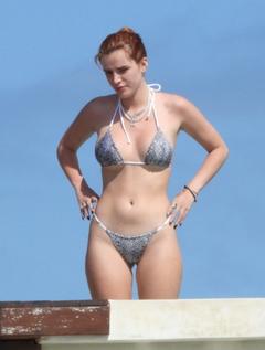 Bella Thorne in bikini at hotel pool in Tulum