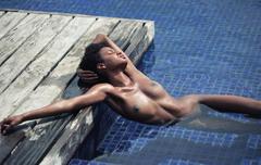 Ebonee Davis fully nude in a water photo