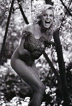 Rebecca Romijn naked but covered