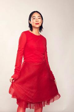 Greta Lee in red dress at IMDb Exclusive Portrait Studio @ 2023 Critics Choice Celebration Honoring Black, Latino & AAPI Achievements - December 2023