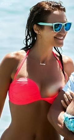 Paula Echevarria nipple slip on a beach