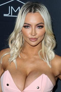 Lindsey Pelas cleavage in pink dress
