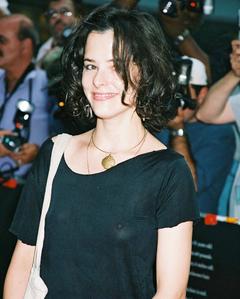 Parker Posey pokies in see through blouse