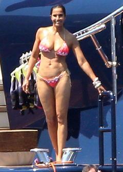 Padma Lakshmi cleavage in bikini on a yacht