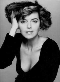 Greta Scacchi cleavage in black top