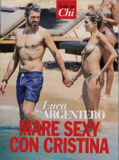 Cristina Marino topless on a beach paparazzi photo
