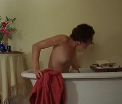Jolene Andersen naked in a bathtub at The Last Beyond