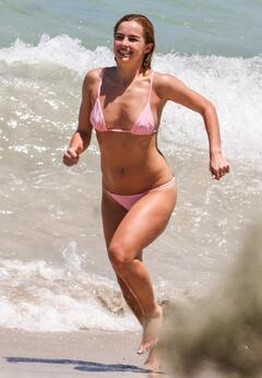 Addison Rae sexy in pink bikini on the beach in Perth - January 04, 2026