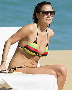 Caroline Flack in bikini on a beach