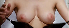 Laura Antonelli shows her nude boobs in Il merlo maschio