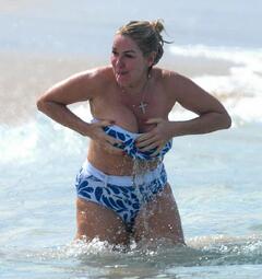 Claire Sweeney making a splash on her Caribbean holiday on the beaches of Barbados