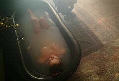 Monica Guerritore nude in a bathtub at Inganno