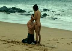 Alex McGegor naked on a beach at Impunity