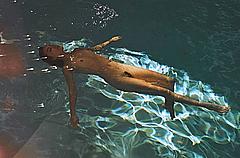 Nicole Branch fully nude in a pool