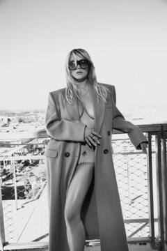 Kesha naked but covered for ELLE by Ruben Chamorro - October 2024