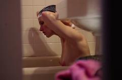 Amy Seimetz naked in a bathtub at Bitter Feast