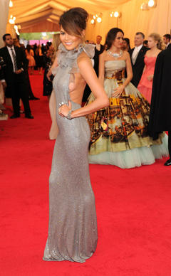 Chrissy Teigen sideboob at red carpet