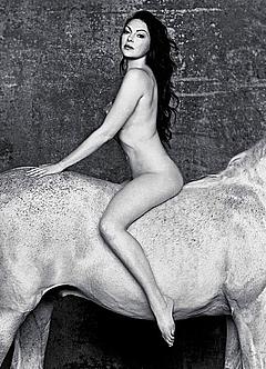 Laura Prepon naked on a horse