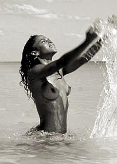 Black Megalyn Echikunwoke naked in a water
