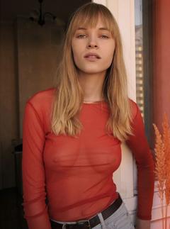 Daria Makurina in red see through top
