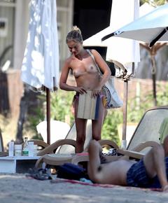 Lady Amelia Windsor topless at a beach in Ibiza