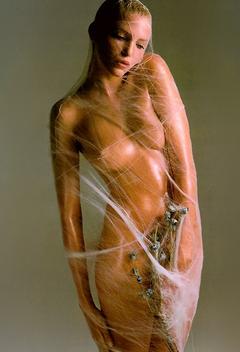 Nadja Auermann wrapped in see through cloth
