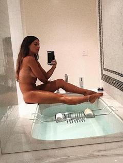 Louise Thompson naked in a bathroom