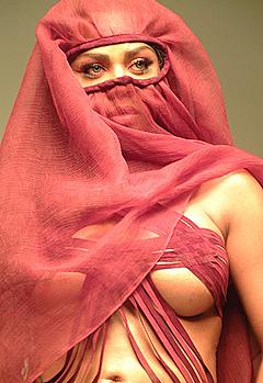 Lil Kim almost topless