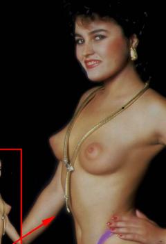 Lory Del Santo posing topless