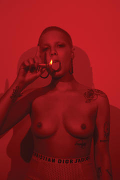 Singer Halsey posing topless