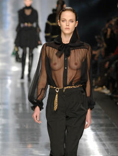 Shannan Click walks runway in see through top