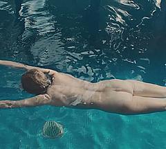 Viviane Albertine naked in pool scene from Exhibition