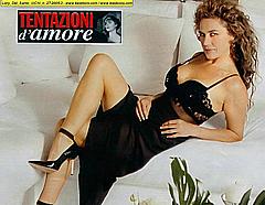 Lory Del Santo in black skirt and lingerie bra