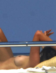 Cindy Crawford topless on a yacht