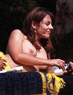 Elizabeth Hurley sunbathing topless