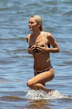 Olivia Dunne spotted in a bikini on a beach in Miami - August 11, 2026